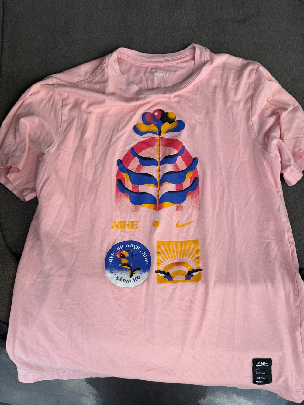 Nike Pink Short Sleeve Tee with Multicolor Graphic